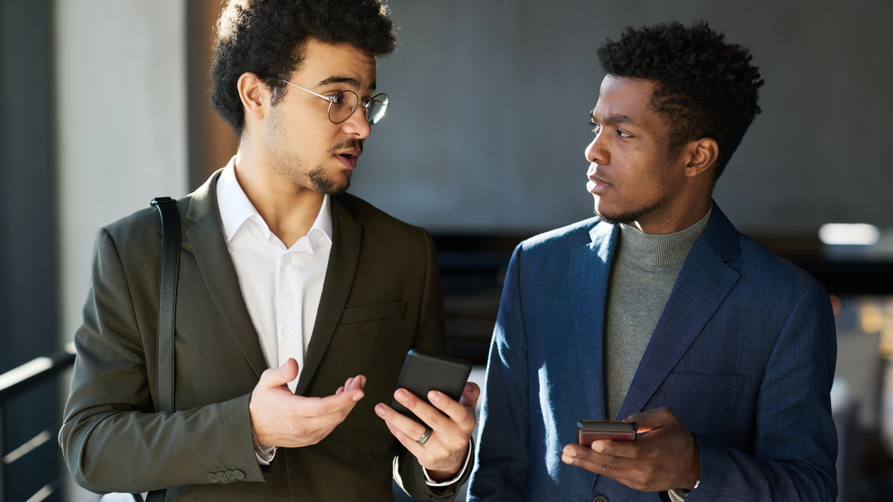 two professionals having a discussion